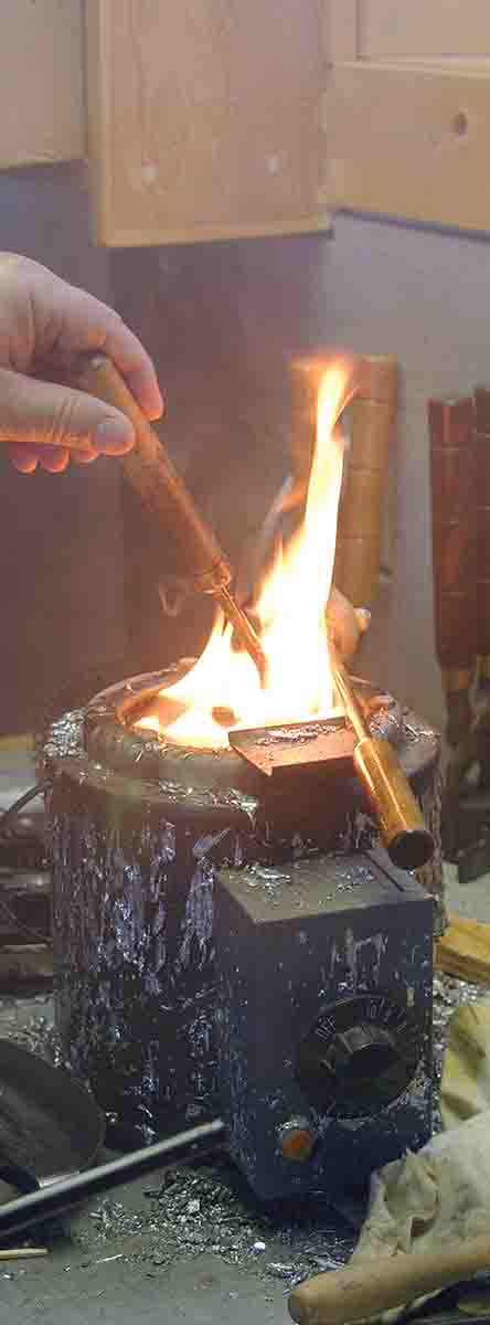 Mike learned 50 years ago to toss some bullet lube or candle wax into the lead pot and ignite it to prevent excess smoke when fluxing, which he only does once during a casting session.